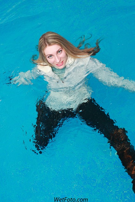wet girl get wet swim fully clothed wet hair jacket tight jeans sweater boots high heels pool