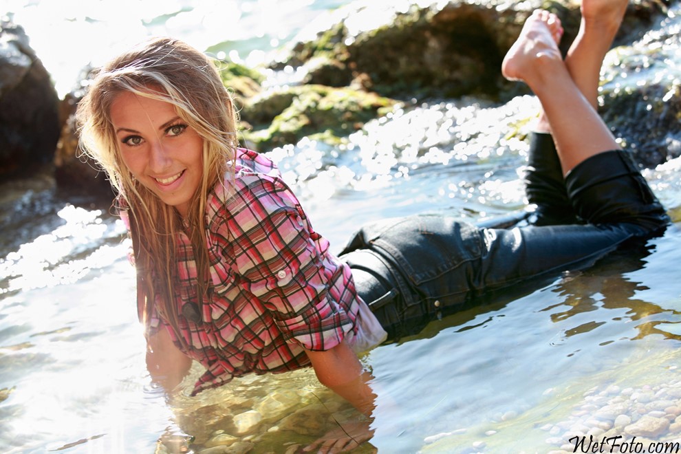 wet girl get wet wet hair swim fully clothed jeans shirt sea