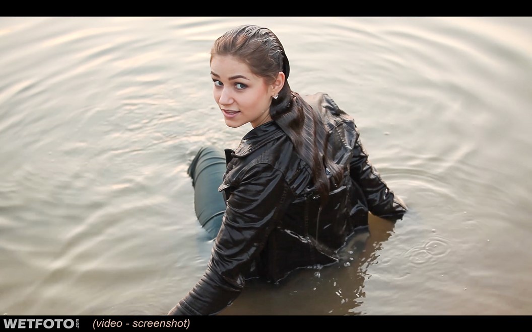 wet girl get wet swim fully clothed wet hair jacket tight jeans boots lake