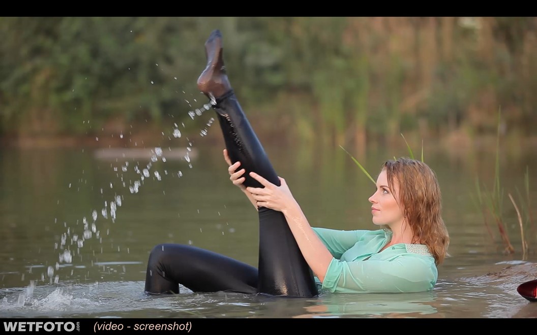 wet girl wet hair get wet blouse leggings high heels swim fully clothed water lake