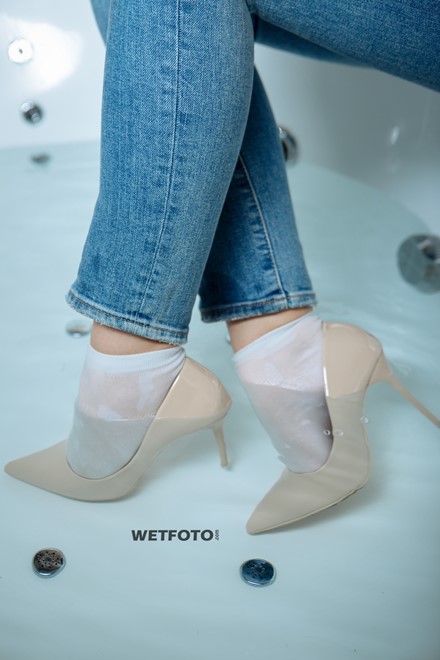 wet girl get wet blonde soaked fully clothed socks blouset jeans shower high heels shoes