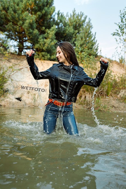 Beautiful Girl In Skinny Blue Jeans Gets Completely Wet At The Lake
