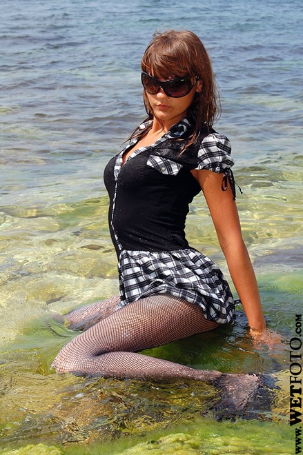 wet girl get wet wet hair fully clothed dress stockings sexy high heels shoes sea