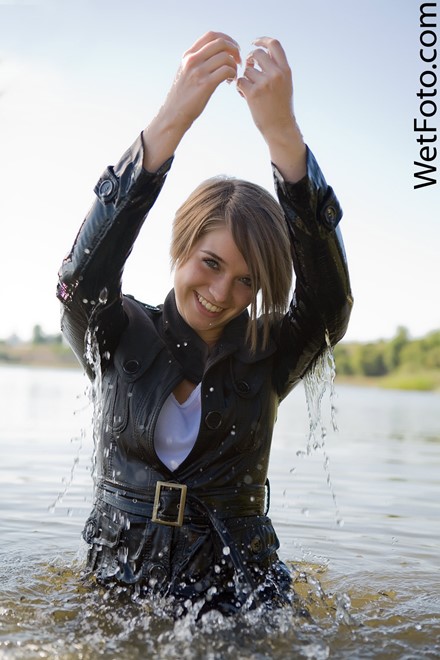 wet girl get wet wet hair fully clothed cloak jeans t-shirt shoes lake