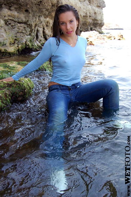 brunette wet girl get wet wet hair fully clothed blouse jeans high heels shoes leather sea