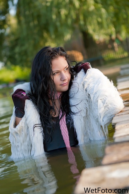 wet girl get wet wet hair swim fully clothed fur coat tight jeans t-shirt scarf shoes lake