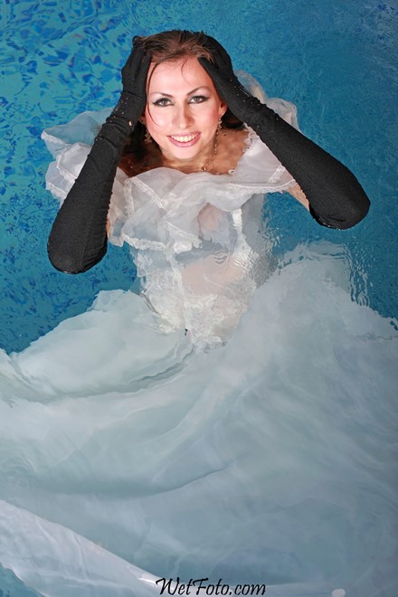 wet girl get wet wet hair fully clothed wedding dress bridal veil gloves leather high heels boots pool