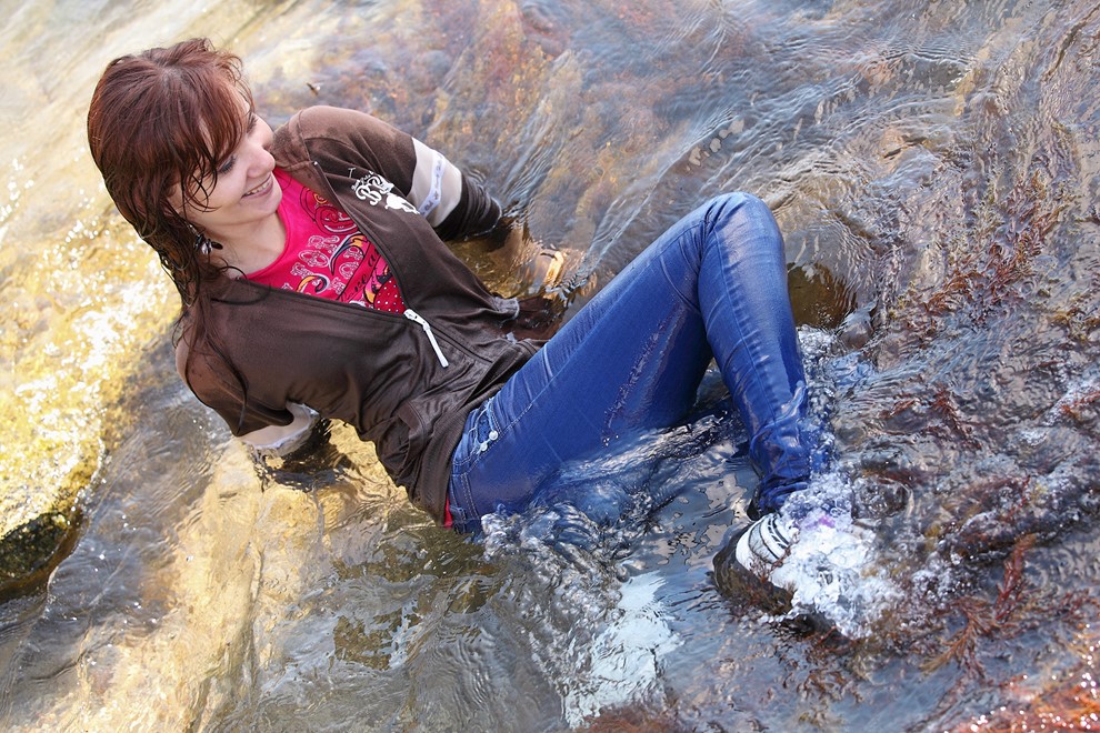 Fully Clothed Girl In Tight Jeans And Sneakers Get Wet On Sea Wetlookone