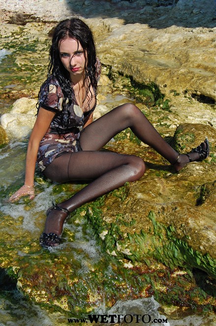 wet girl get wet wet hair fully clothed dress stockings high heels sandals sea waves