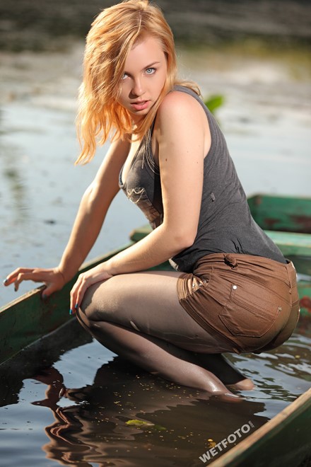 wet girl get wet swim fully clothed wet hair jacket shorts tights high heels lake