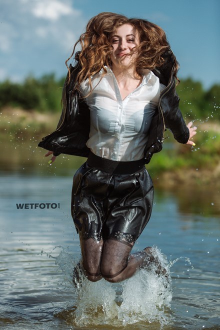wetfoto wet fully clothed girl in the lake