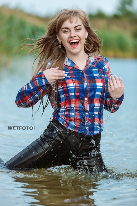 Wetlook by Pretty Girl in Fully Soaked Shirt and Black Jeans on Lake ...