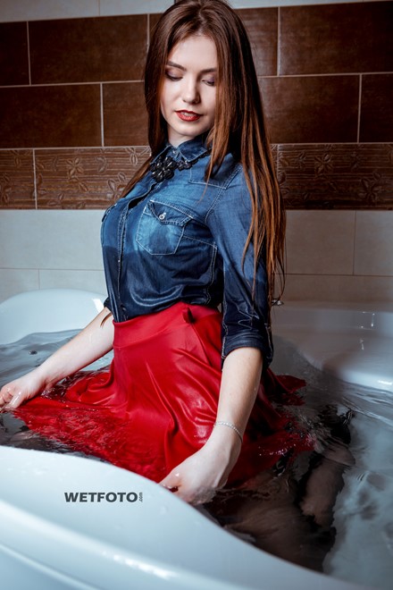 Fully Clothed Hot Girl In Red Skirt Denim Shirt And Stock