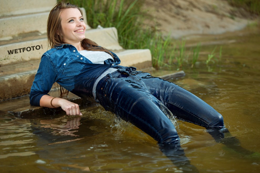 Wetlook By Smiling Girl In Wet Tight Jeans And Gray T Shirt Without Bra