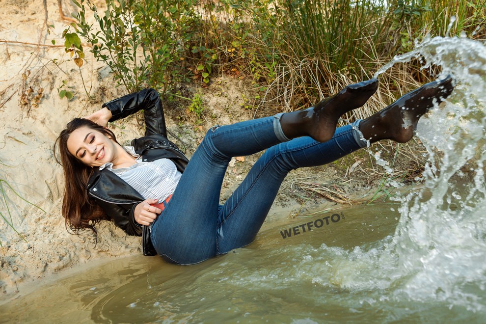 Beautiful Girl In Skinny Blue Jeans Gets Completely Wet At The Lake Wetlookone
