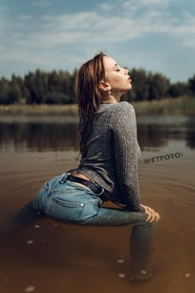 #568 - Wetlook Video with Hot Fully Clothed Girl in Wet Skinny Jeans and Sneakers