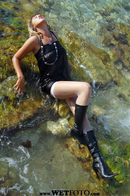 wet girl wet hair get wet swim fully clothed tunic fishnet tights high heels boots fully soaked sea
